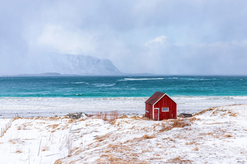 Red Beach House Awaiting Snowstorm Canvas Prints